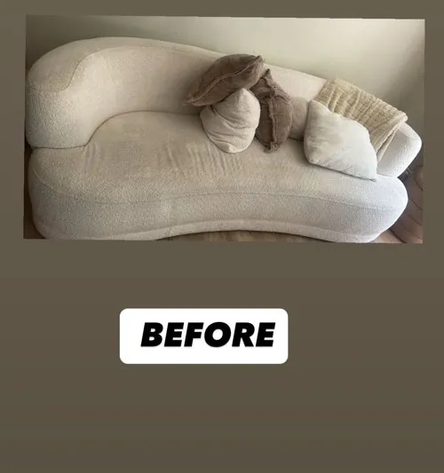 Boucle sofa before upholstery cleaning, showing watermarks and stains