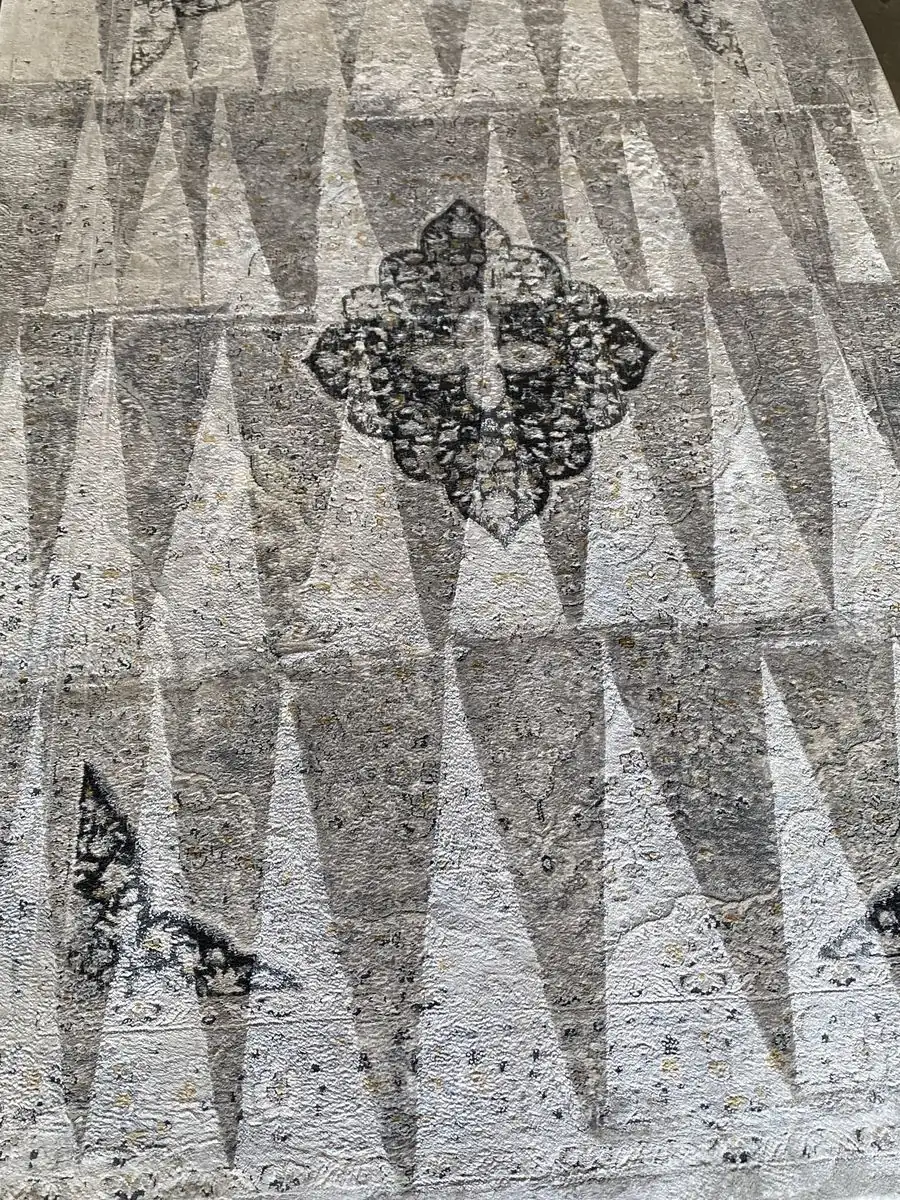 Close detail of area rug pile after gentle hot water extraction cleaning
