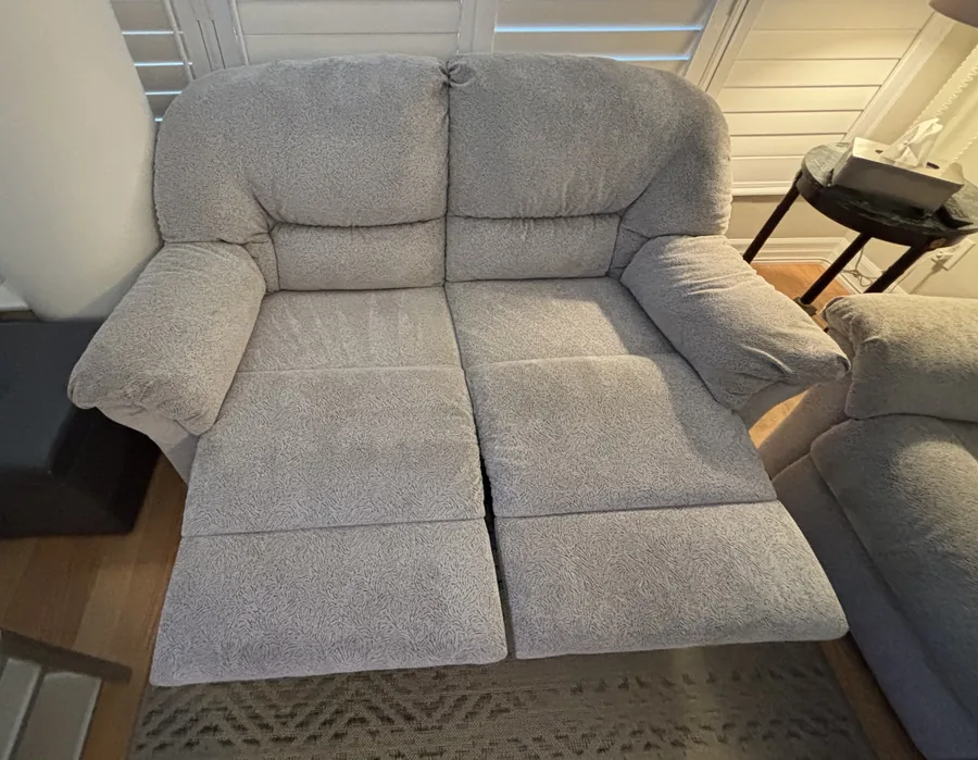 Matching fabric loveseat after upholstery cleaning in the same Toronto home